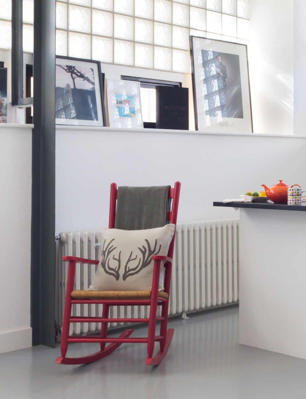 Dehavilland Studios, East London | Detail of re-painted rocking chair in main kitchen | Interior Designers